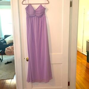 Lavender colored strapless and glowy ball gown